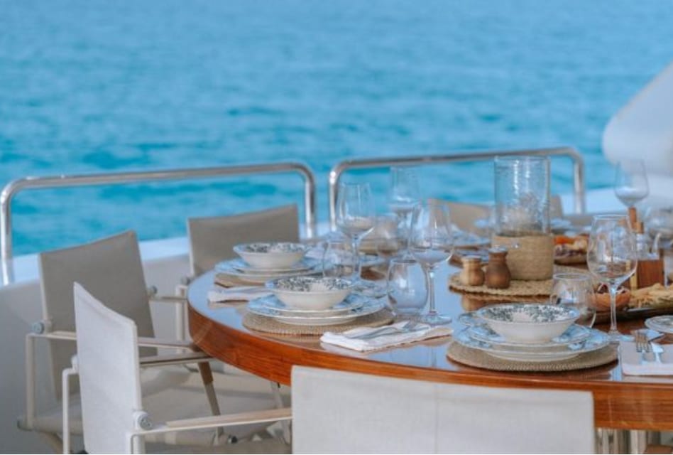 Blue-and-white china laid for lunch on deck